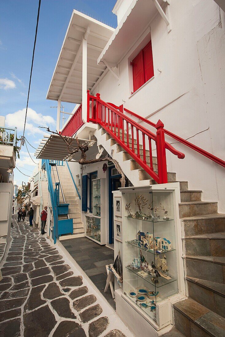 Whitewashed houses with colorful doors and railings in town center, Mykonos, Cyclades Islands, Greek Islands, Greece, Europe.