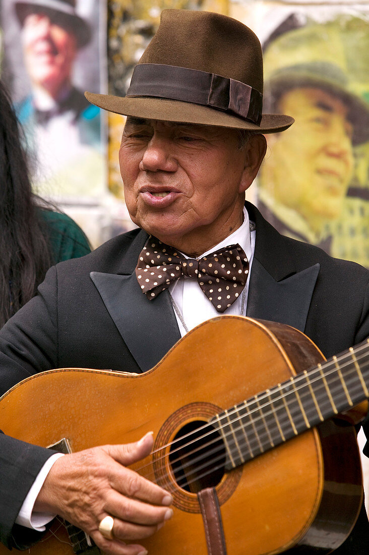 Argentina, Buenos Aires, San Telmo District, Plaza Dorrego, San Telmo Fair, tango singer