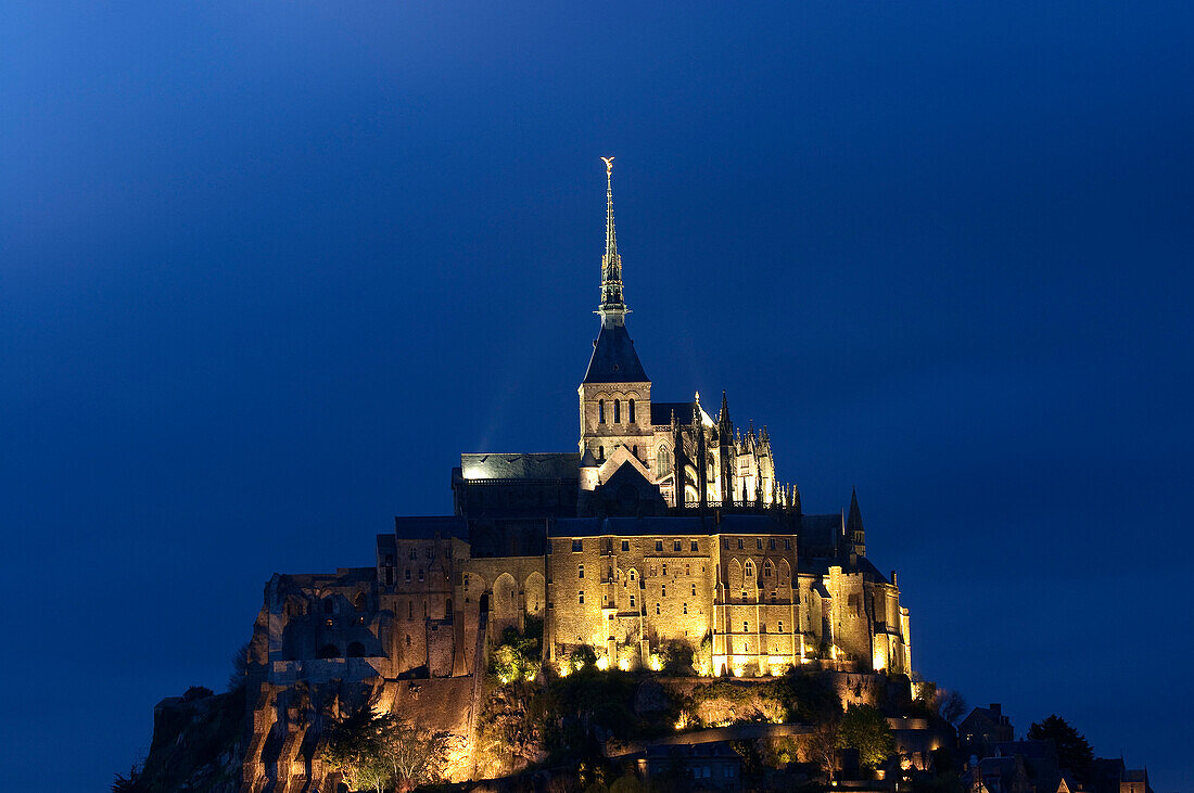 France, Manche, illuminated Mont Saint Michel, listed as World Heritage by UNESCO