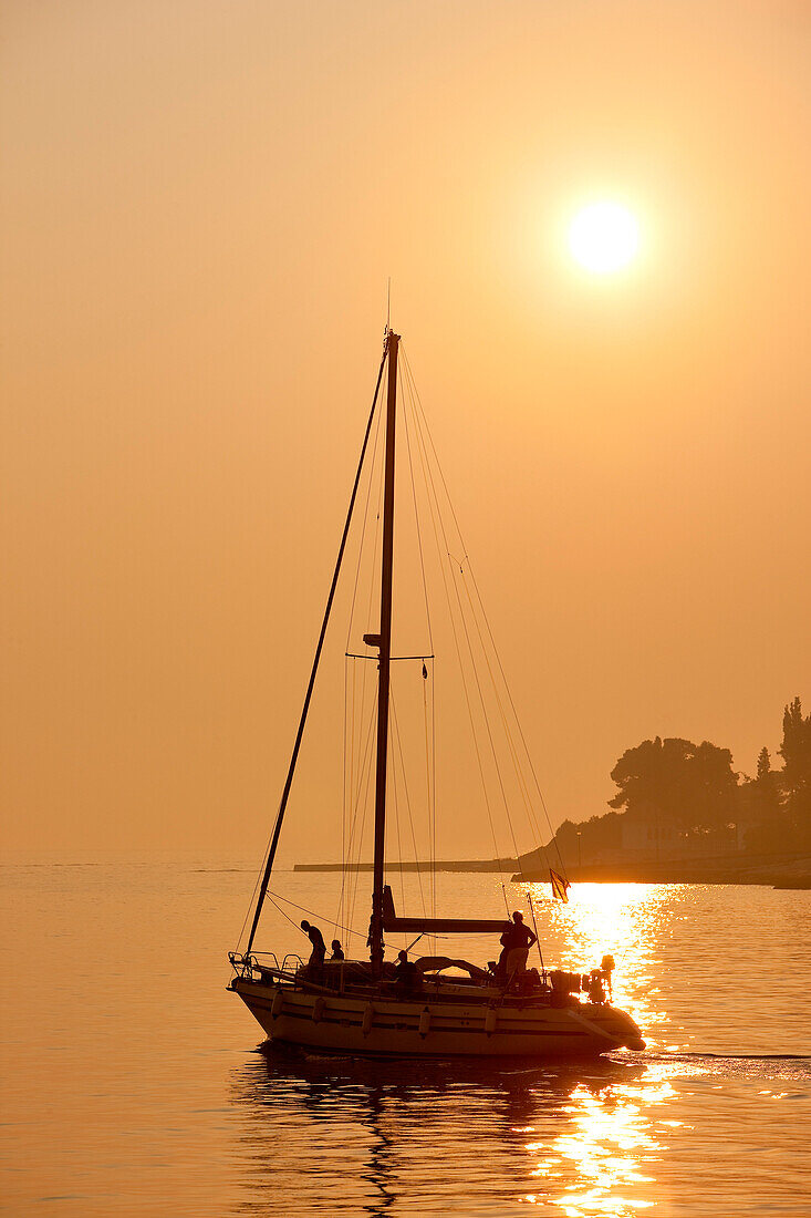Croatia, Istria, Adriatic Coast, Rovinj, sailing boat and sunset