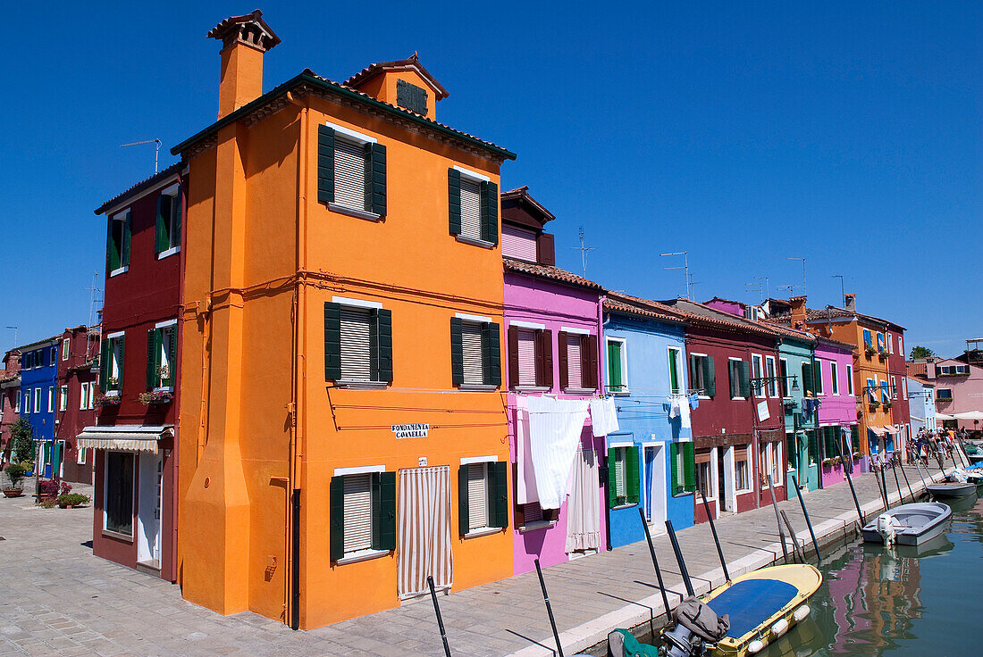 Italy, Venezia, Burano Island, listed as World Heritage by UNESCO, typical colored houses on the main canal of the city