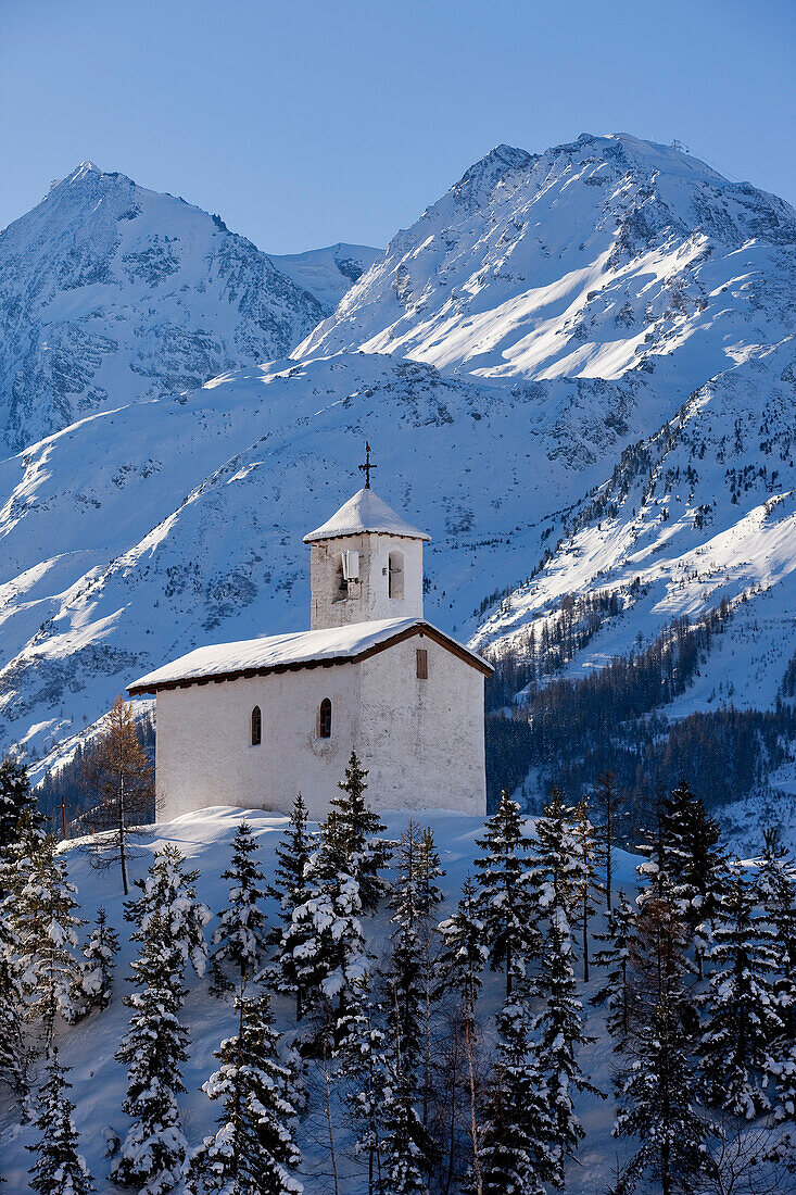 France, Savoie, Parc National de La Vanoise, Montvalezan, Chatelard Hamlet, St Michel Chapel with view on the Mont Pourri (3779m)