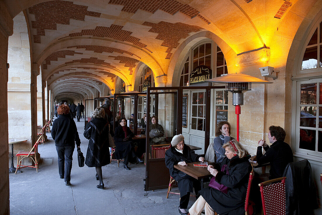 France, Paris, the Place des Vosges, Cafes under the arcades