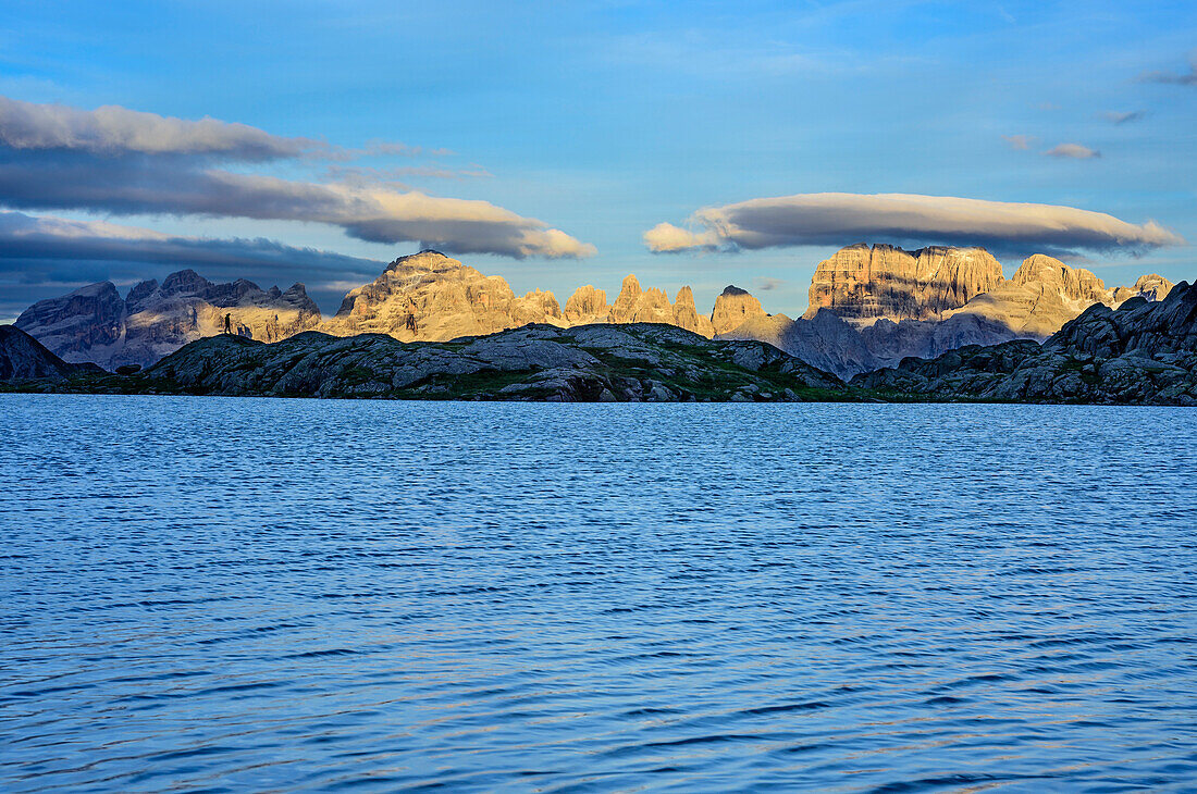 Mountain lake and mood of clouds above Brenta, lake lago Nero, Adamello-Presanella Group, Trentino, Italy