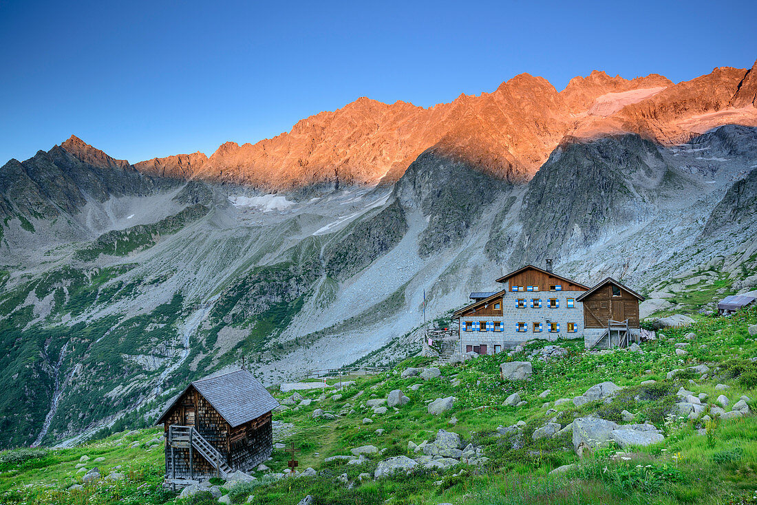 Hut rifugio Denza with Cima Scarpaco and Cima Vedrettine in background, hut rifugio Denza, Adamello-Presanella Group, Trentino, Italy