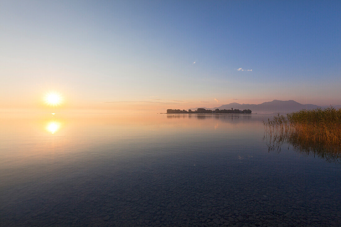 View over Chiemsee to Fraueninsel, near Gstadt, Bavaria, Germany