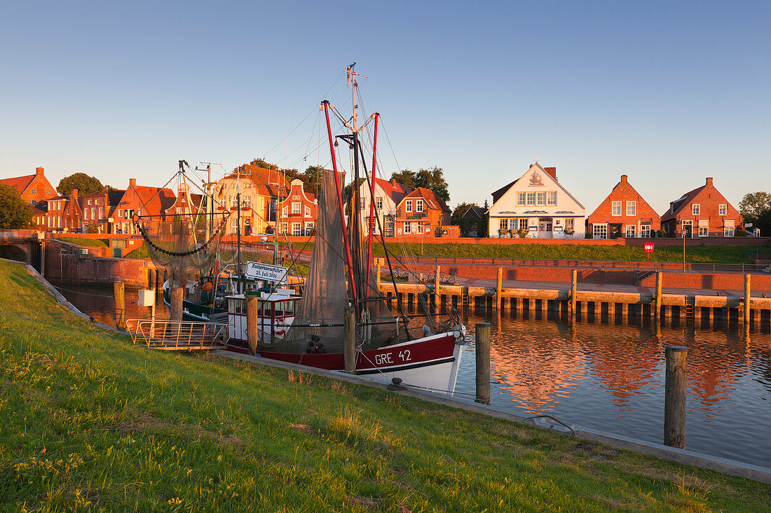 Fishing cutter in the harbour, Greetsiel, East Friesland, Lower Saxony, Germany