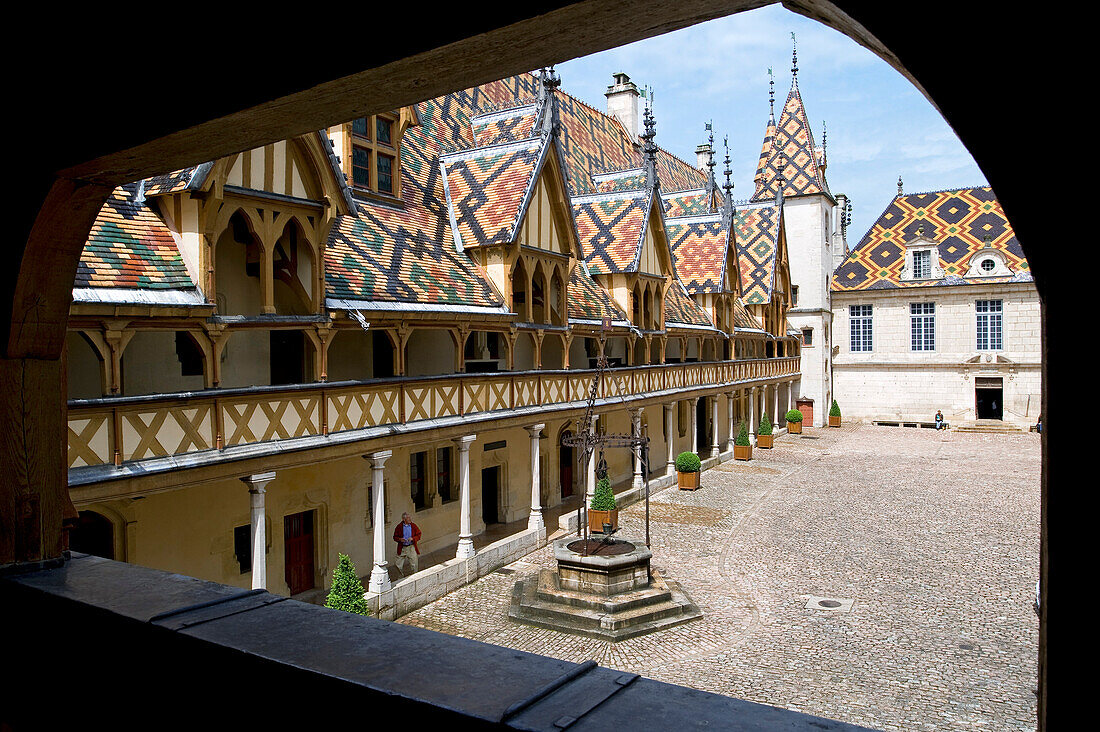France, Cote d'Or, Beaune, the court of honor at the Hotel Dieu des Hospices, the roof tiles glazed multicolored