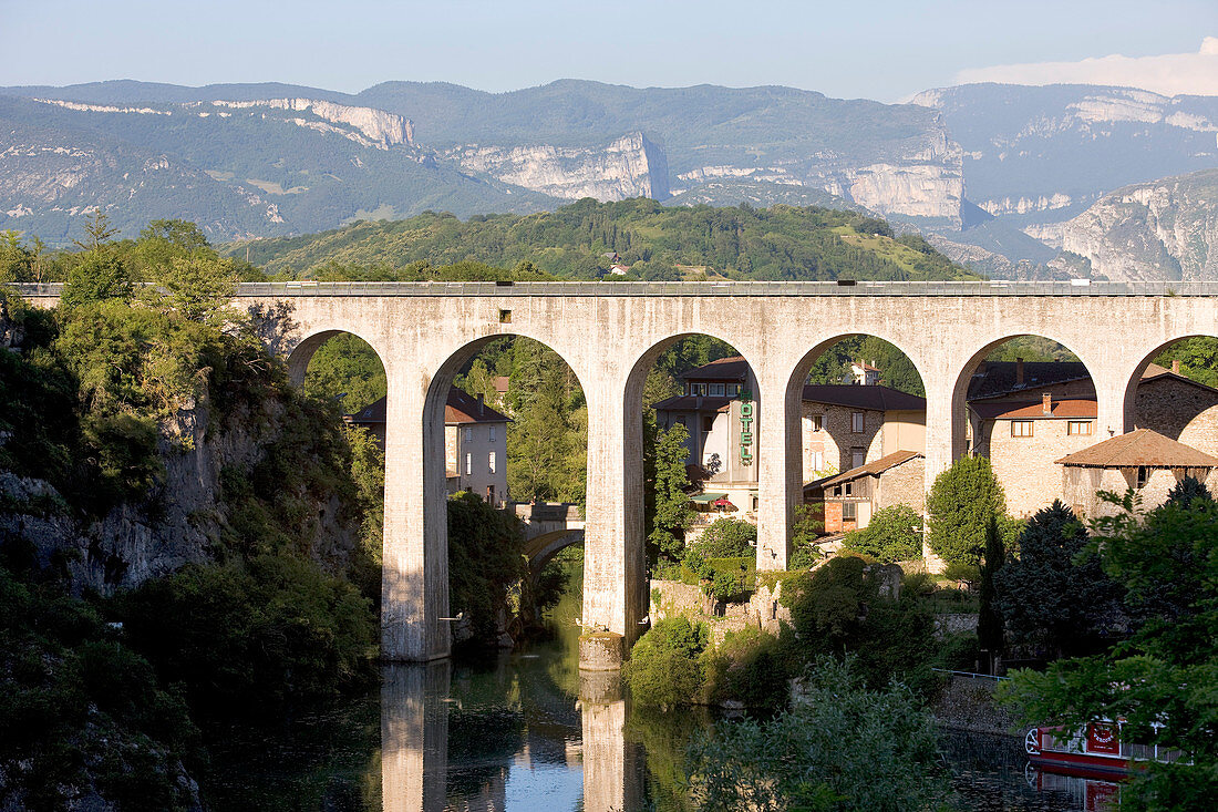 France, Drome, Saint Nazaire en Royans, the artificial lake under the aqueduct (the Canal de la Bourne) built in 1876 and converted into a pedestrian way, view of the Parc Naturel Regional du Vercors in the background