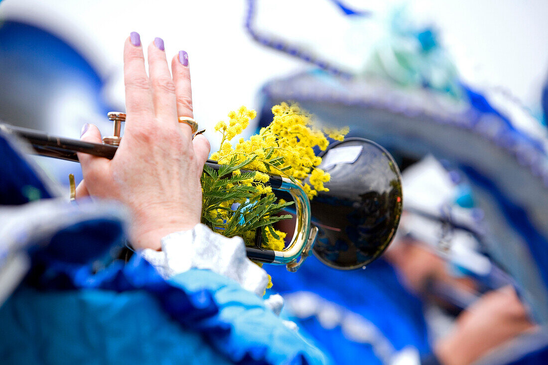 France, Alpes Maritimes, Mandelieu la Napoule, Mimosa Festival, parade, detail of a musician playing the trumpet