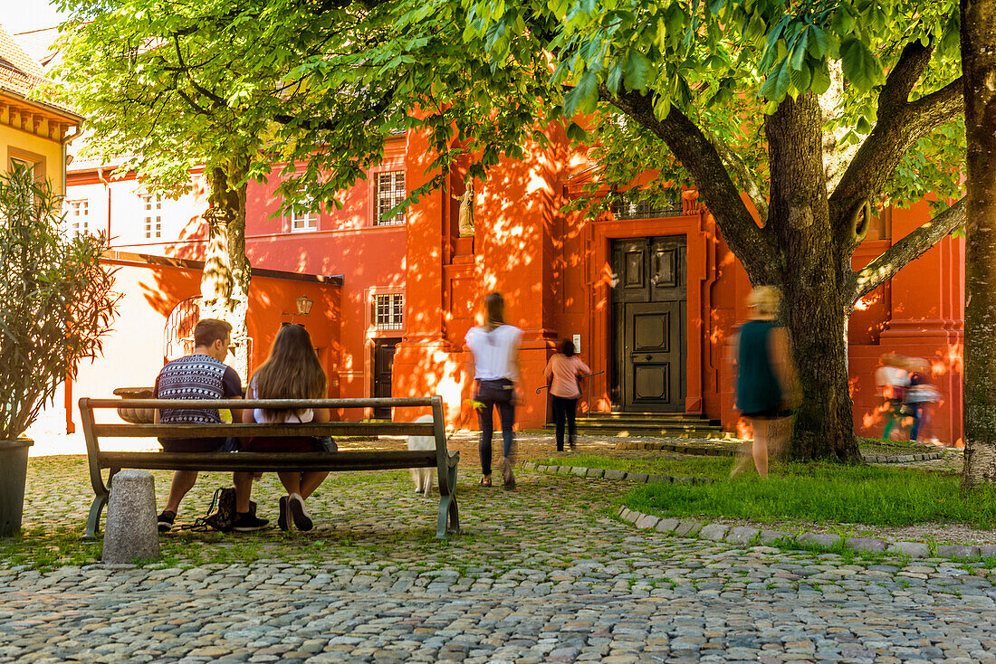 Adelhauser Platz and people with motion blur, Freiburg, Black Forest, Baden-Wuerttemberg, Germany