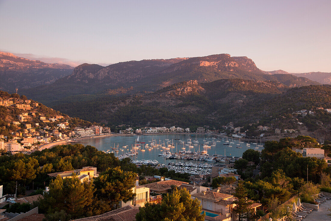 Overhead view to town and bay from Jumeirah Port Soller Hotel & Spa at sunset, Port Soller, Mallorca, Balearic Islands, Spain