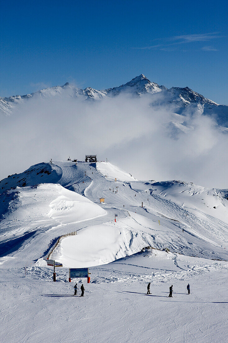 France, Savoie, Les Menuires, Val Thorens, Meribel, crossroad of the Trois Vallees ski resort from the Mont de la Chambre 2850m with view on the Aiguille de Peclet 3562m