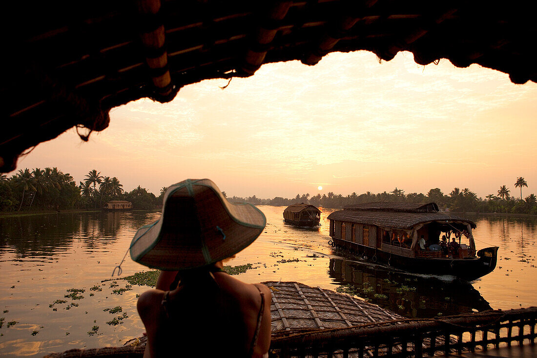 India, Kerala State, Allepey, the backwaters, houseboats (old transport barge converted for the touristic cruising of the canals)