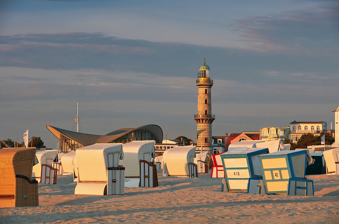 Beach at Warnemuende with lighthouse and tea pot, Mecklenburg Vorpommern, Germany