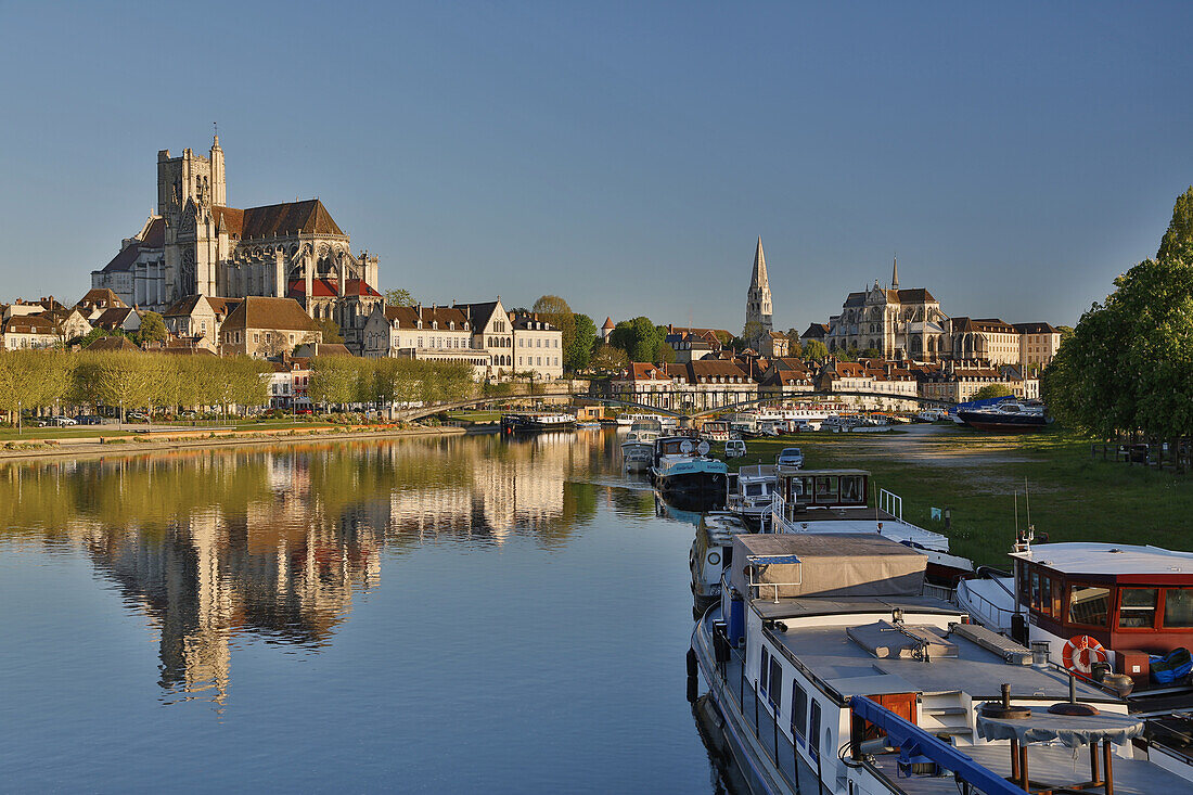 View across the river Yonne at Saint-Étienne Cathedral and Saint-Germain Abbey at Auxerre , Departement Yonne , Burgundy , France , Europe