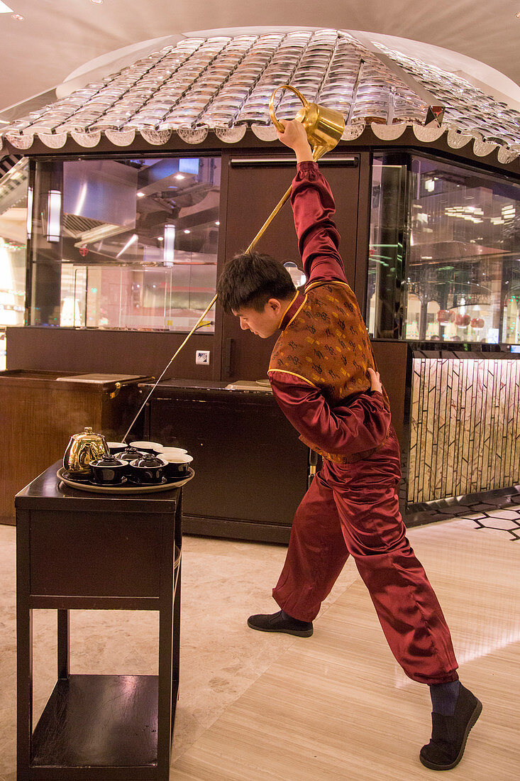 Elaborate tea service at Noodle & Congee restaurant of Grand Lisboa Hotel & Casino, Macau, Macau, China