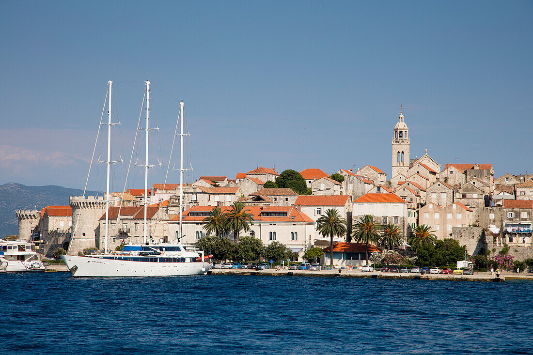 Motor sailing cruise ship M/S Panorama (Variety Cruises) at pier with Korcula Old Town and St. Mark's Cathedral, Korcula, Dubrovnik-Neretva, Croatia