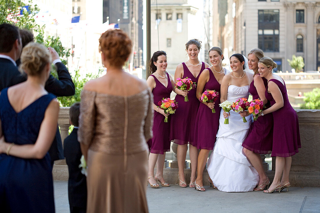 United States, Illinois, Chicago, Magnificent Mile District, bride and her bridesmaids