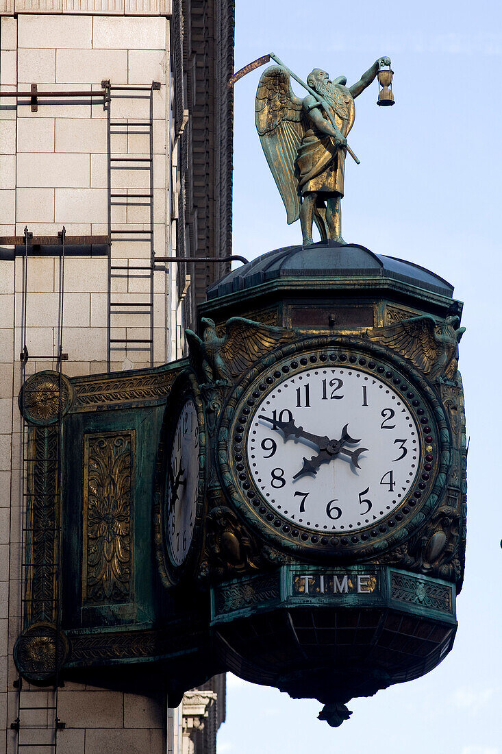 United States, Illinois, Chicago, Wacker Drive, decorative clock at the corner of Jeweler's Building, statue symbolizing Time with its scythe and hourglass