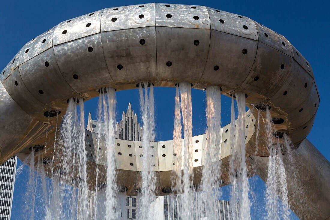 Detroit, Michigan - The Dodge Fountain in Hart Plaza, designed by Isamu Noguchi, with the One Detroit Center office building in the background