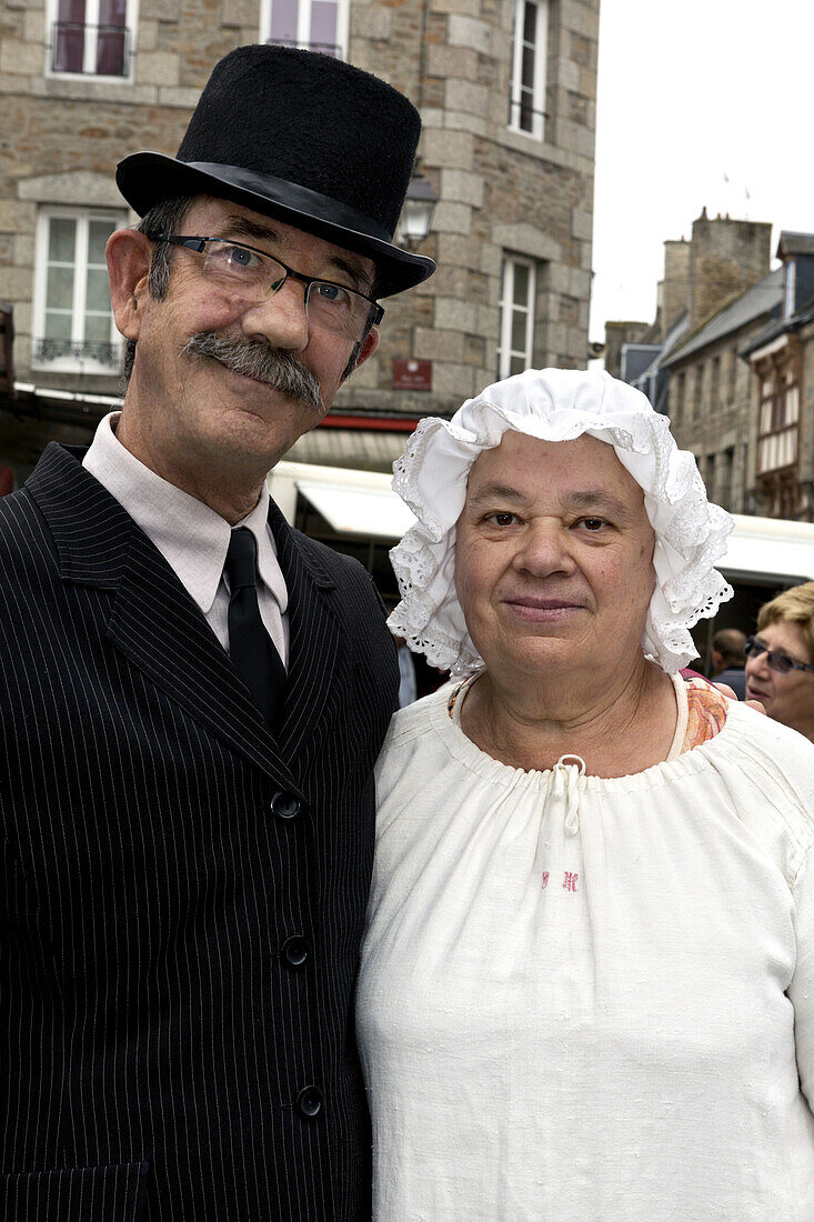 Traditionally dressed couple, in Quintin, La Bretagne en Rose, Bretagne, France