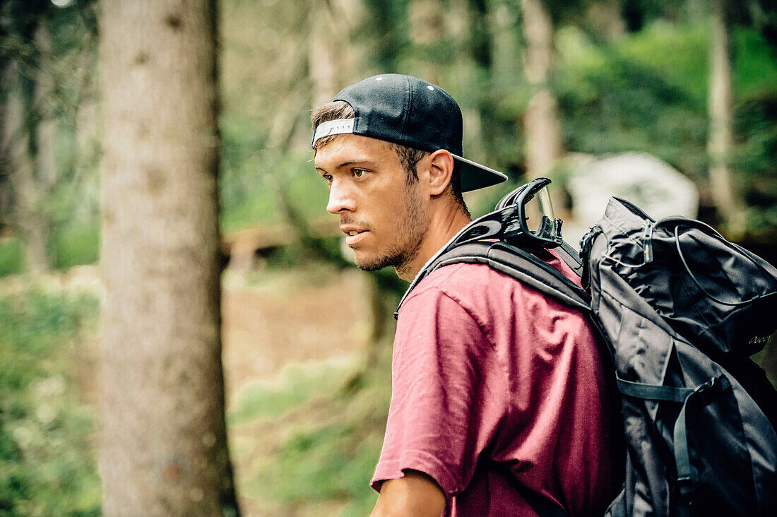 Portrait of a young Mountainbiker, Mountainbike, Hut, Brandnertal, Vorarlberg, Austria