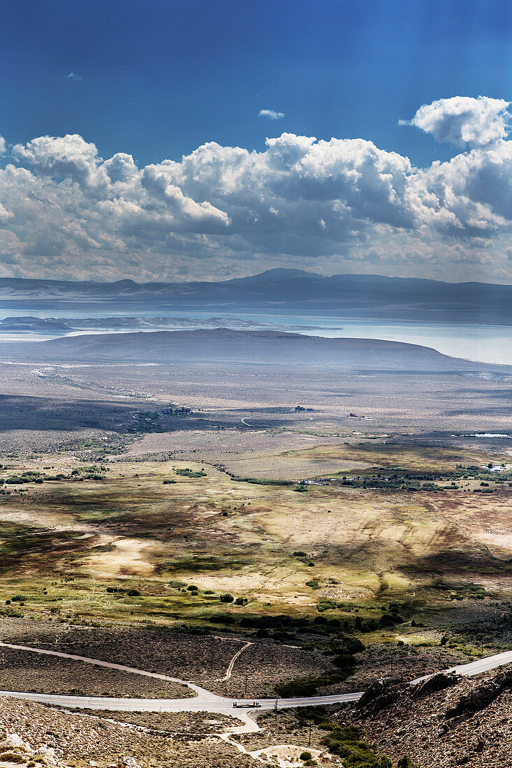 Looking down on Highway 395 on California with Mono Lake in the background.