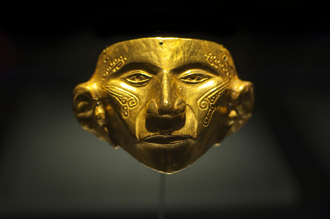 An ancient gold mask at the Museo Del Oro, Bogota, Colombia, South America