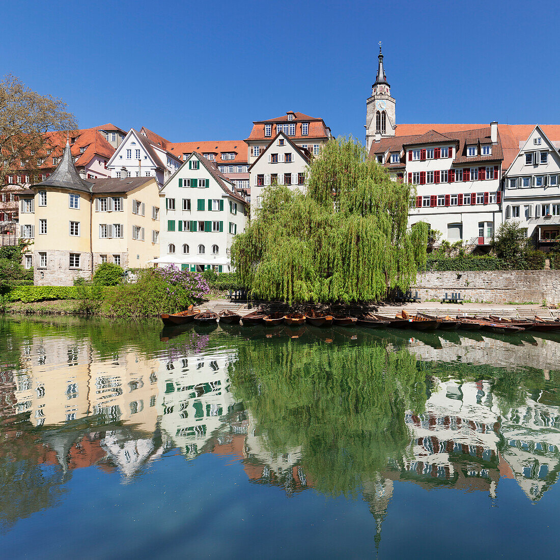 Old town with Hoelderlinturm tower and Stiftskirche Church reflecting in the Neckar River, Tuebingen, Baden-Wurttemberg, Germany, Europe