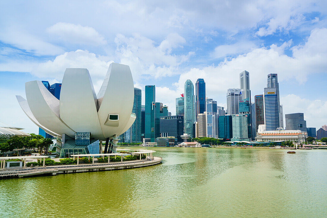 The lotus flower shaped ArtScience Museum overlooking Marina Bay and the financial district skyline, Singapore, Southeast Asia, Asia