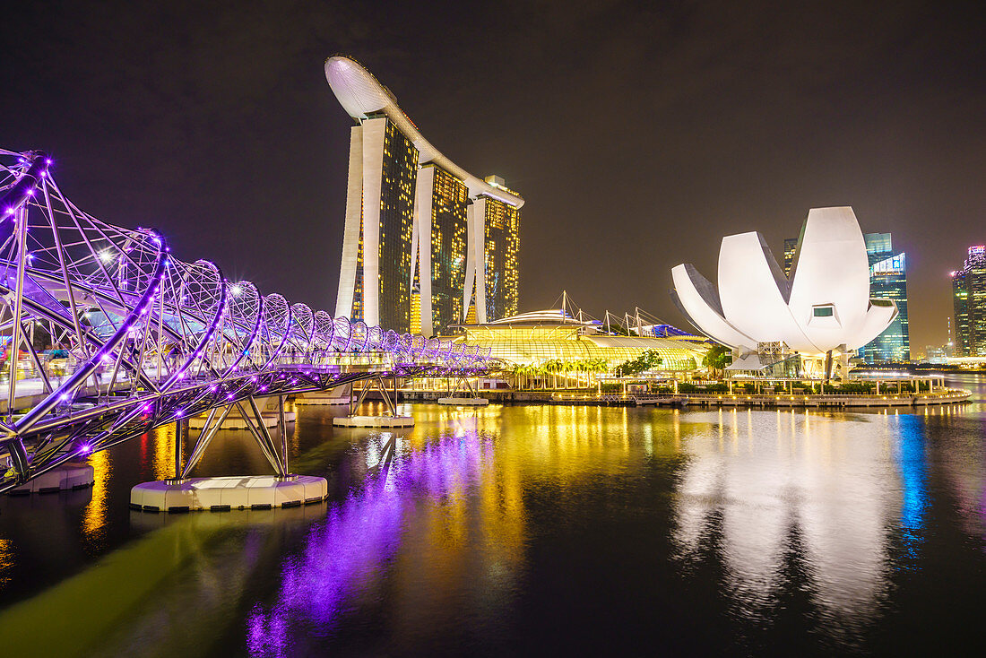Helix Bridge, Marina Bay Sands and ArtScience Museum illuminated at night, Marina Bay, Singapore, Southeast Asia, Asia