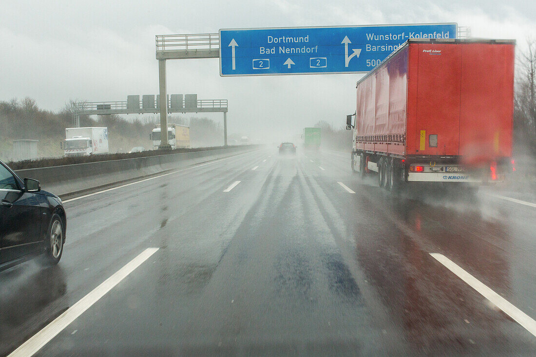 German Autobahn, A2, driving in rain, spray, visibility, weather conditions, windscreen, motorway, freeway, speed, speed limit, traffic, infrastructure, Germany