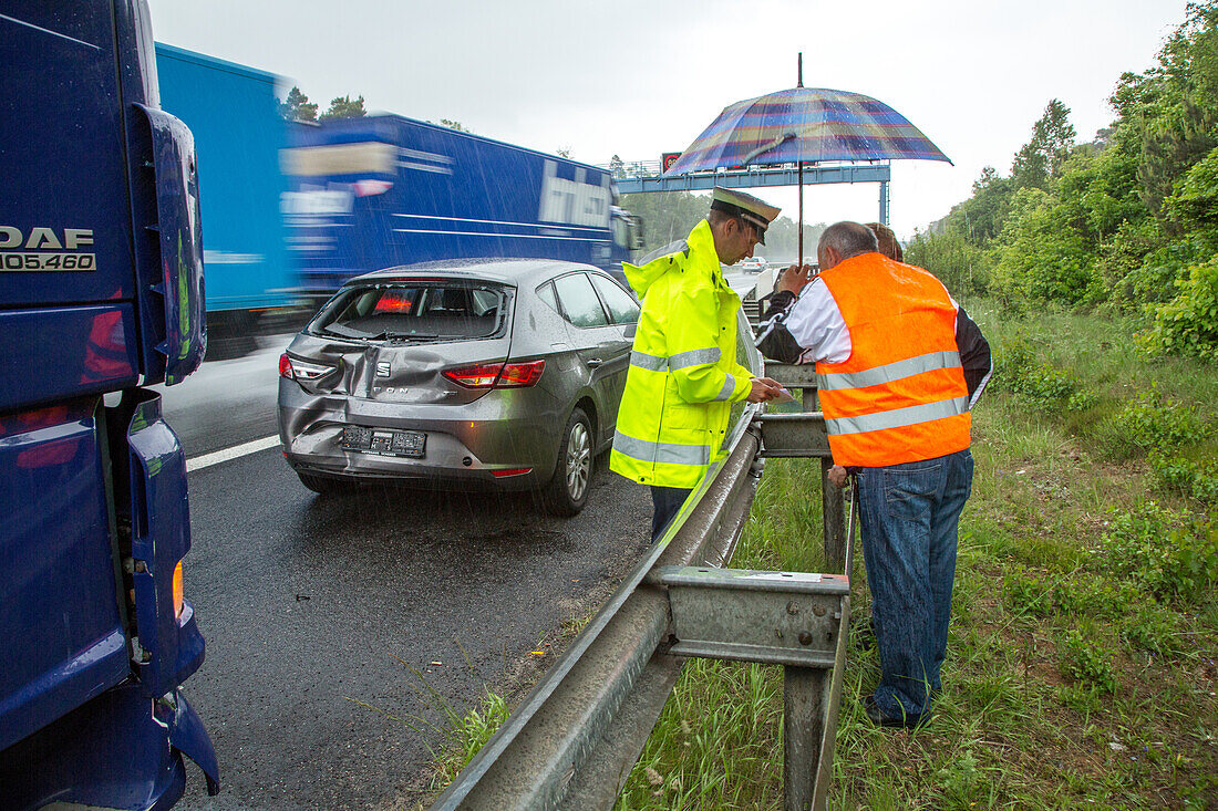German Autobahn, A 62, police attends accident, rain, insurance, motorway, highway patrol, freeway, emergency, danger, speed, speed limit, traffic, infrastructure, Germany