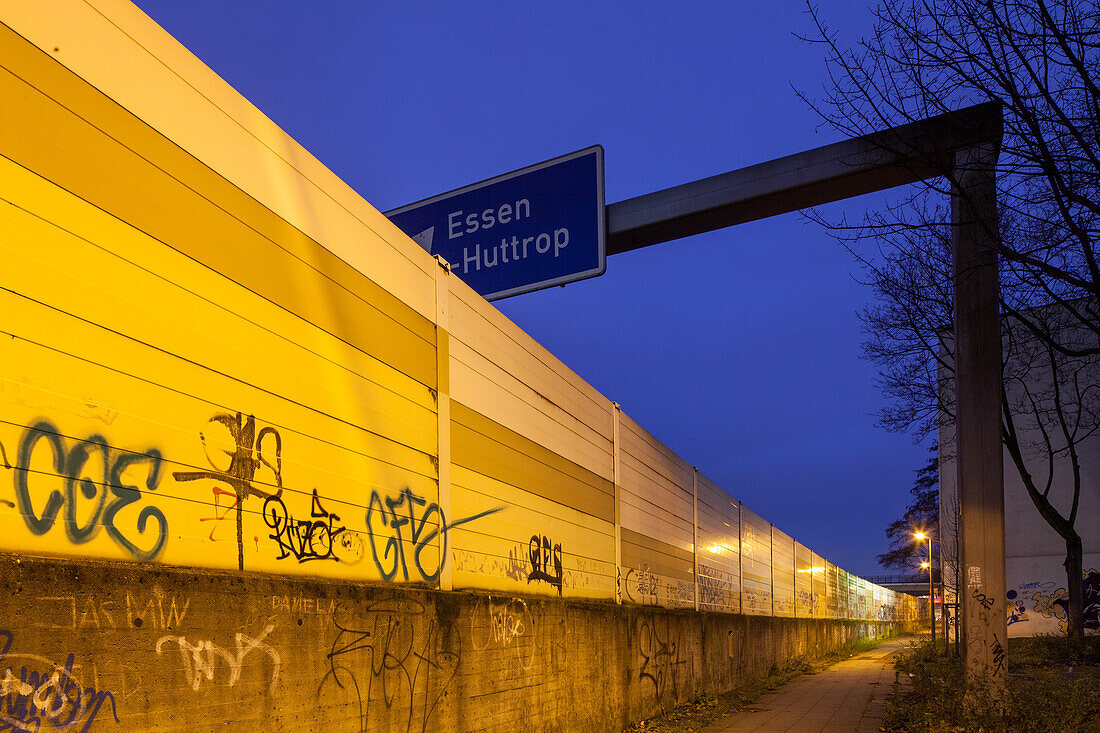 German Autobahn A 40, noise barrier, wall, night, pedestrian path, street lights, houses, urban, motorway, highway, freeway, speed, speed limit, traffic, infrastructure, Essen, Germany