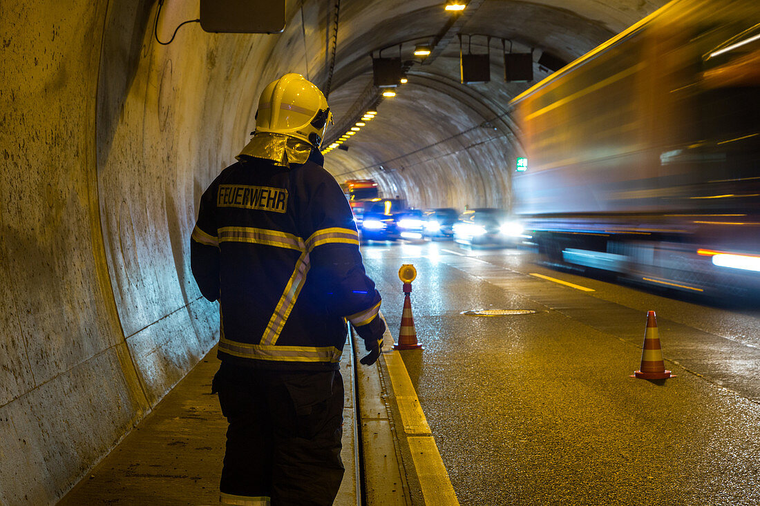 German Autobahn, A 71, fireman inside the tunnel, accident, emergency, safety, motion, blurred, motorway, freeway, speed, speed limit, traffic, infrastructure, Germany