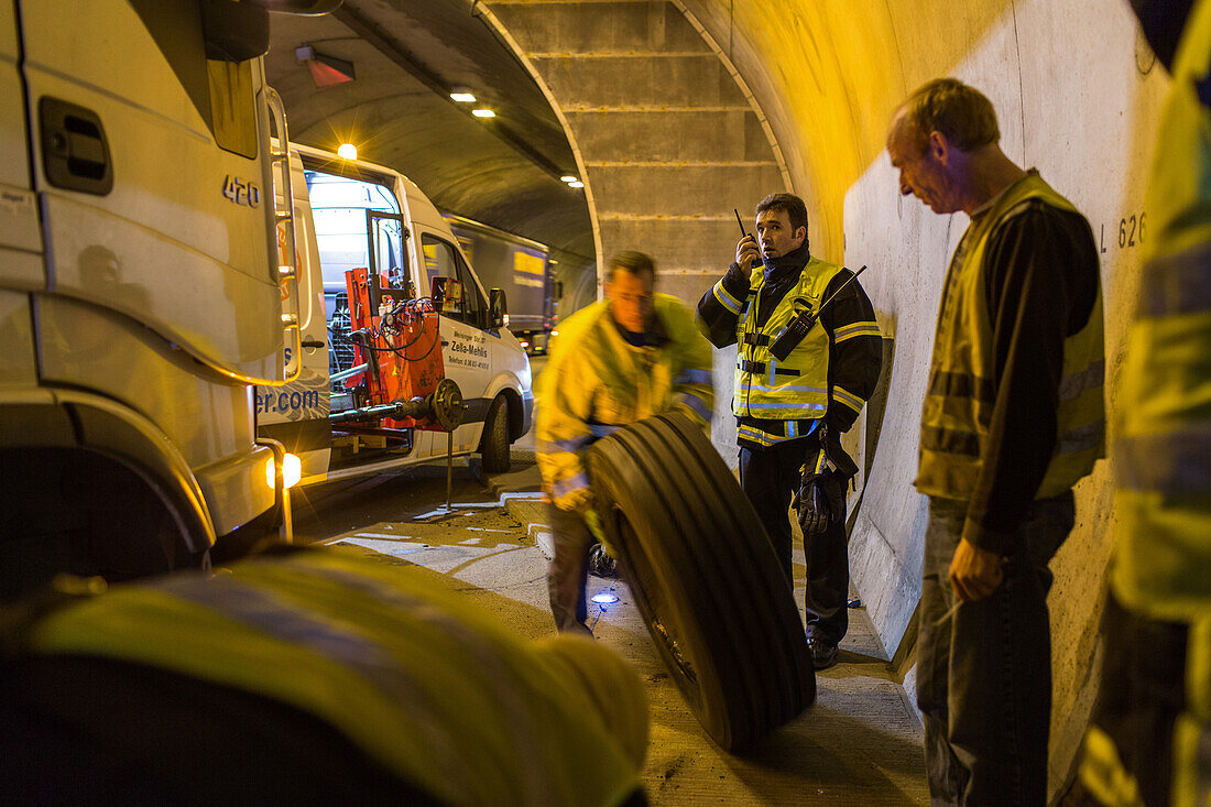 German Autobahn, A 71, firemen inside the tunnel, accident, tyre, truck, repair, emergency, safety, motion, blurred, motorway, freeway, speed, speed limit, traffic, infrastructure, Germany