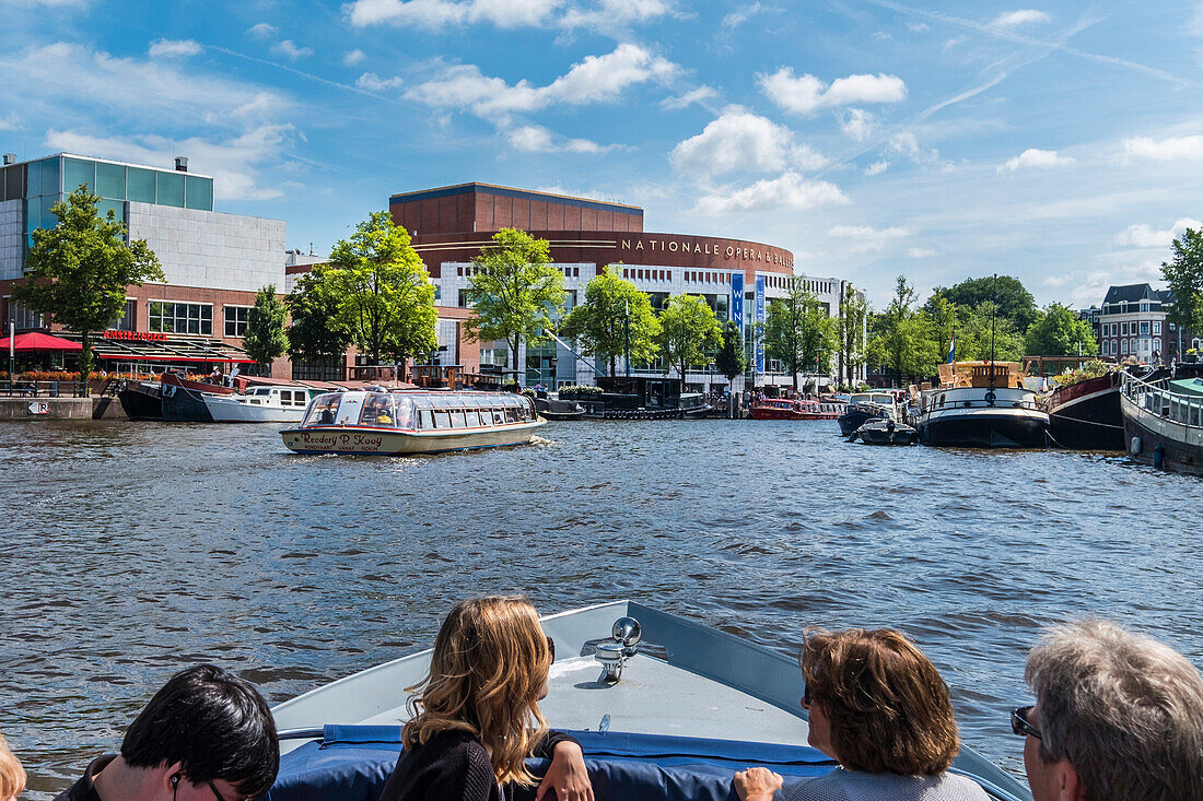 tourist boats on the Grachten in Amsterdam, Netherlands