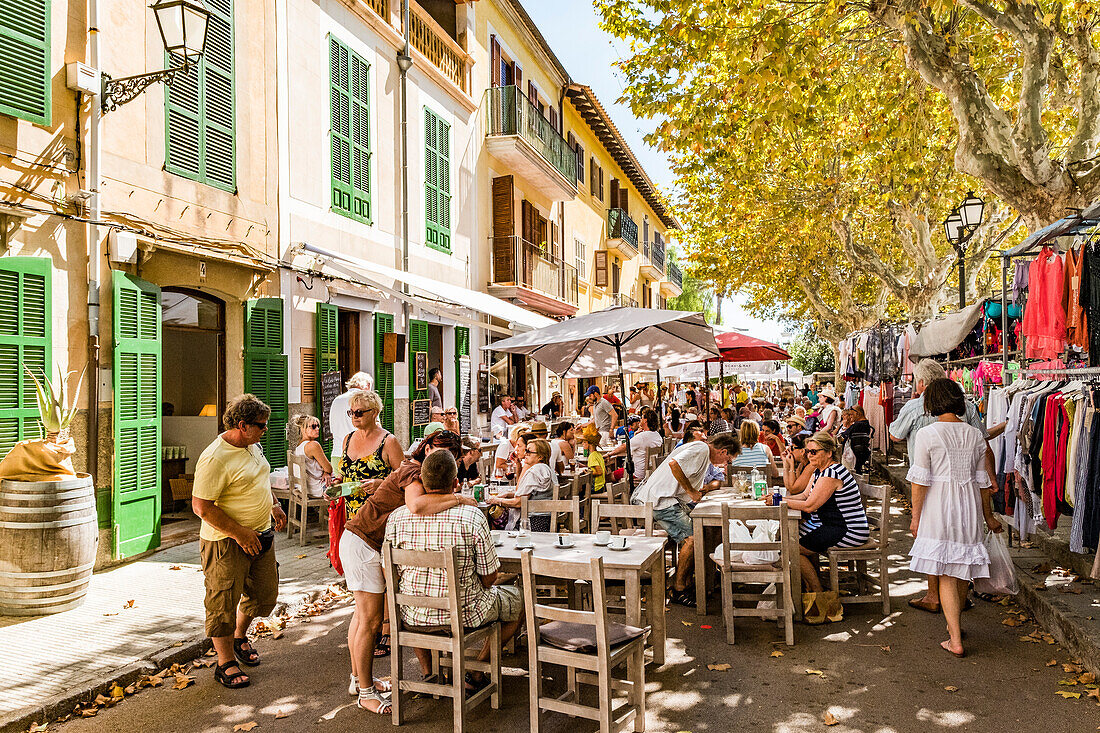 people in the sidewalk cafes of Arta, Mallorca, Balearic Islands, Spain