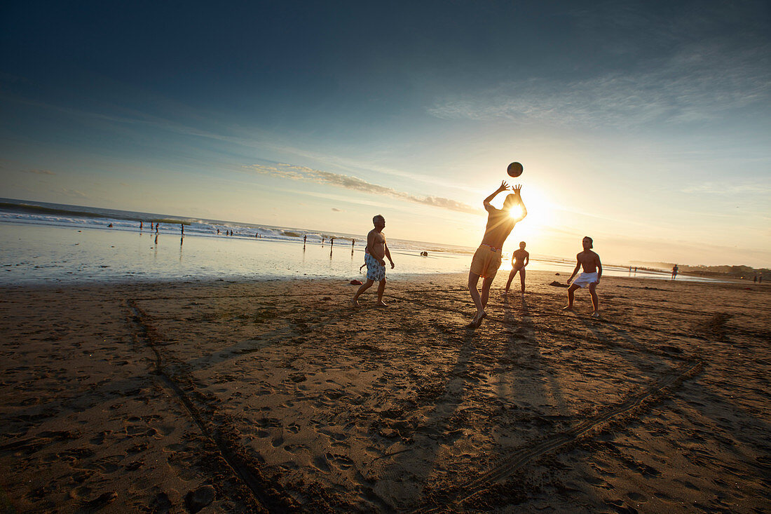 Beachvolley players on the beach of Canggu, Ebbe, Bali, Indonesia