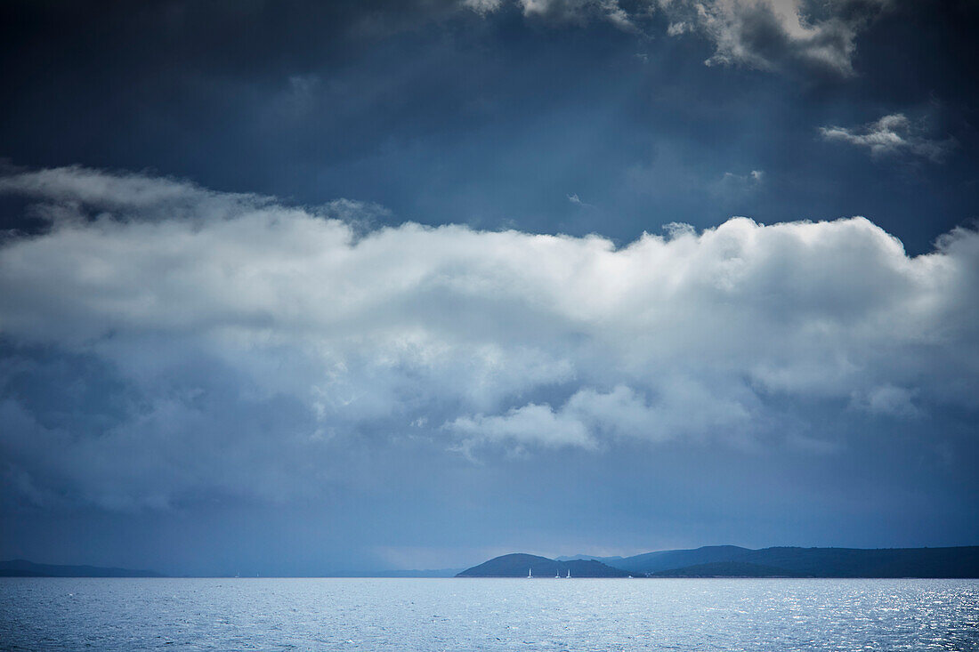Sailing yachts with departing thunderstorm, Kornati Islands, Adriatic Sea, Croatia