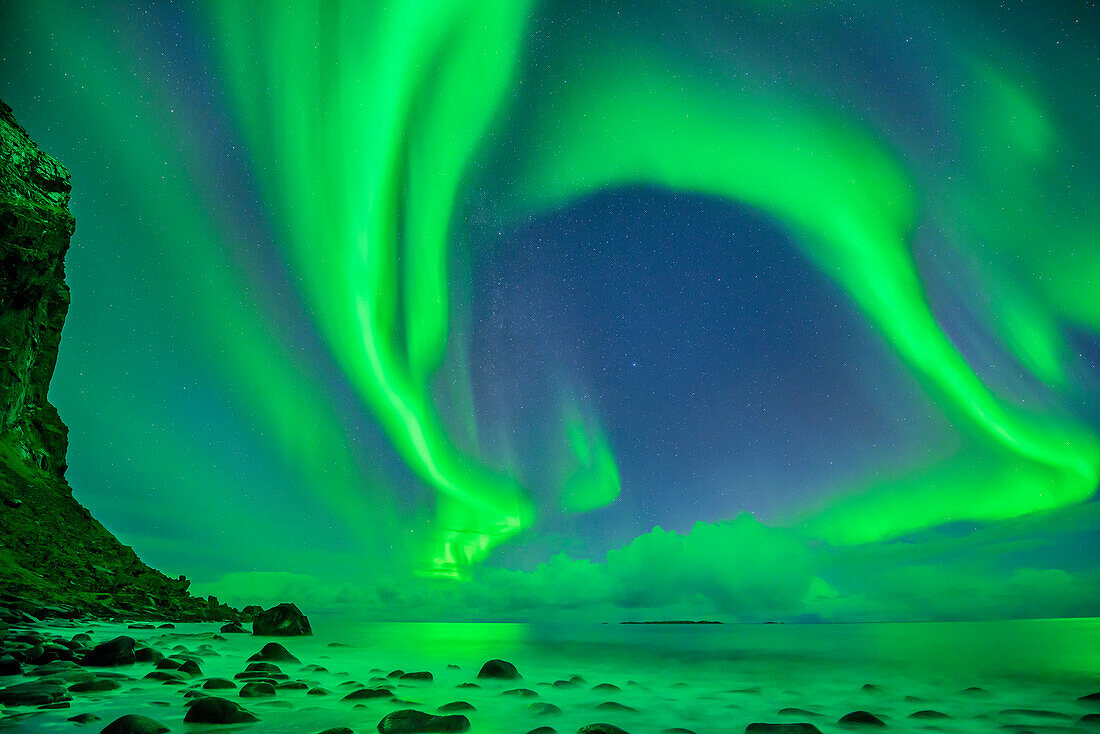 Aurora borealis, Aurora above beach and Northern Atlantic Ocean, Lofoten, Norland, Norway