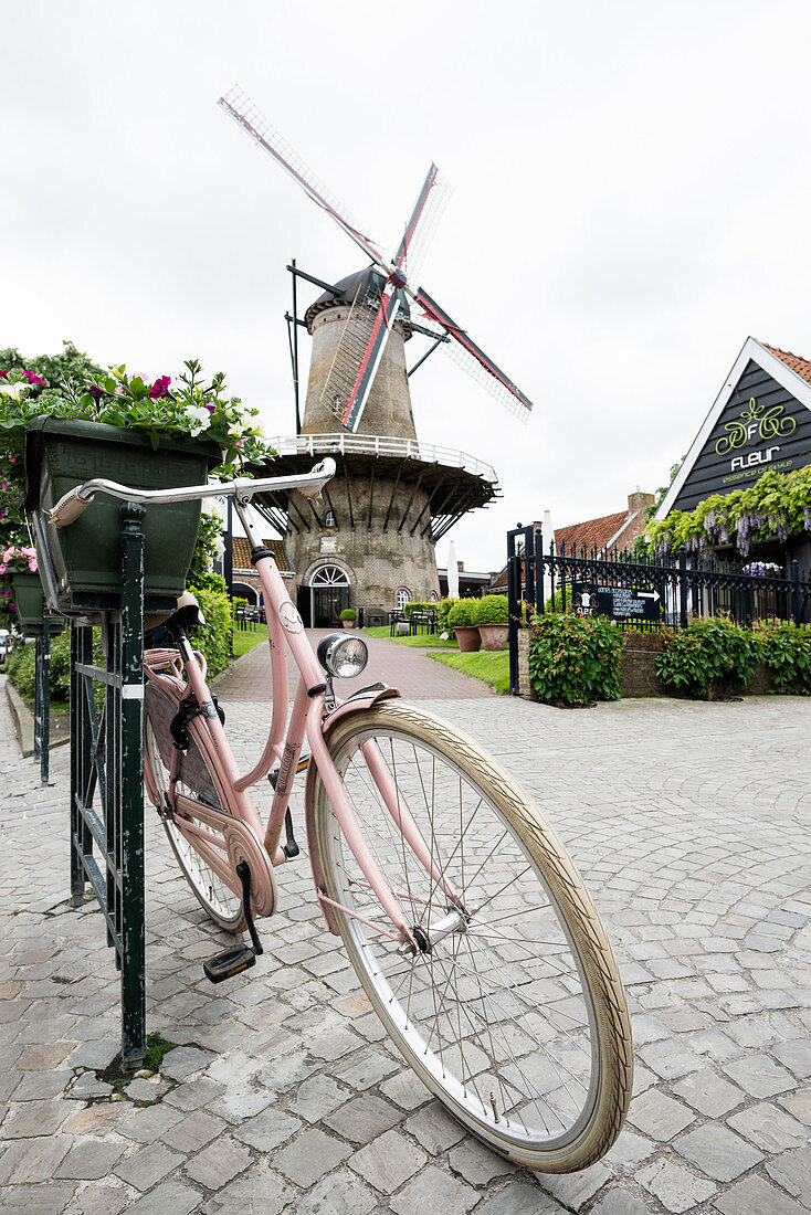 Dutch windmill and bicycle, Sluis, Zeeland, Netherlands