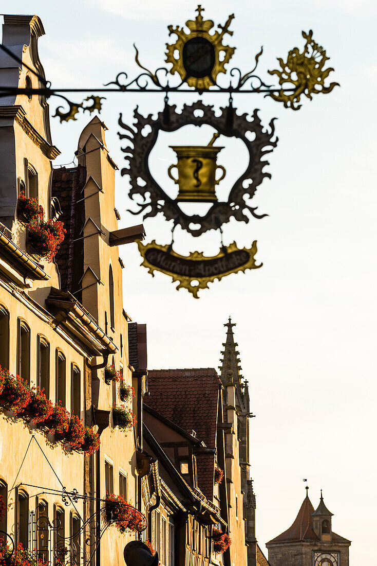 Historical signs in the Herrengasse street, Rothenburg ob der Tauber, Bavaria, Germany