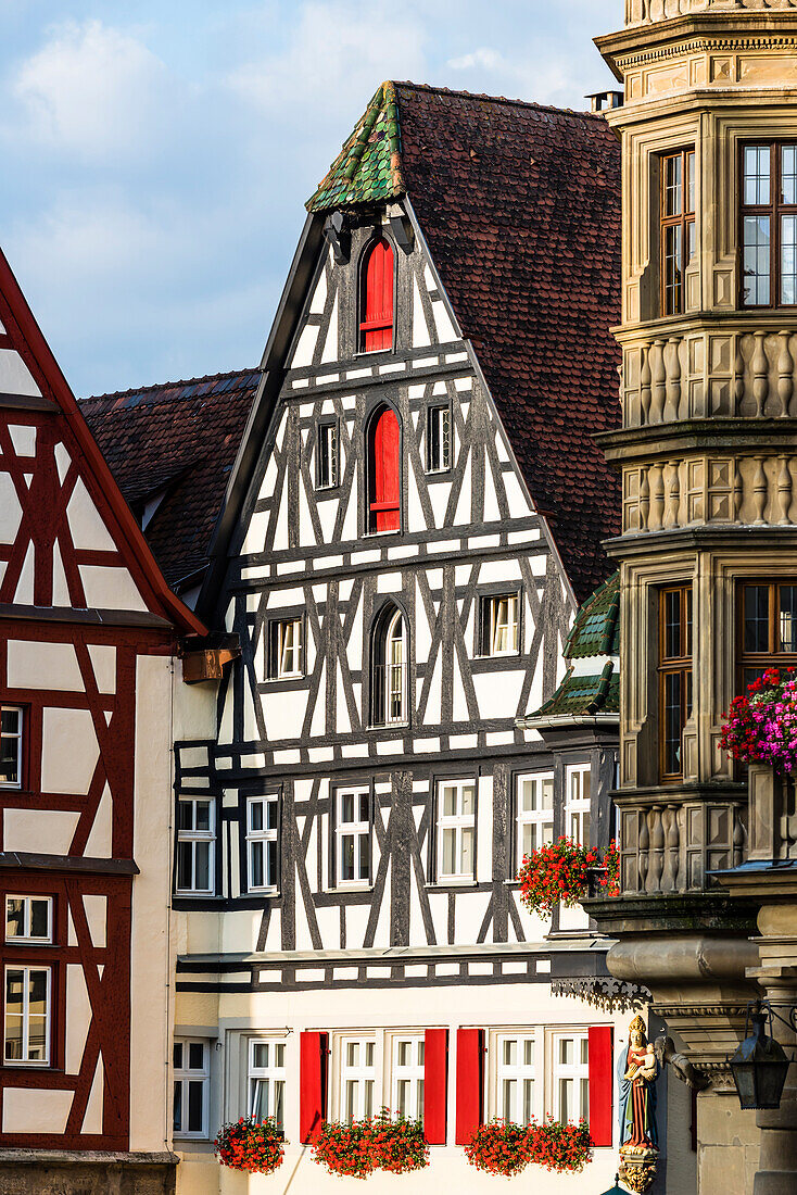 Half timbered house facades on the town hall square, Rothenburg ob der Tauber, Bavaria, Germany