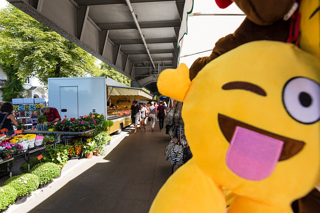 The longest weekly market in Hamburg in Isestrasse under the subway bridge, Hamburg, Germany