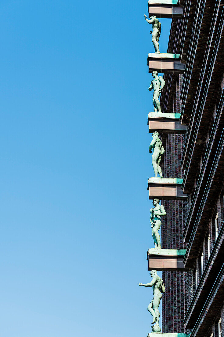 Sculptures in the facade of Brahms office, a historical office house in the city centre, Hamburg, Germany