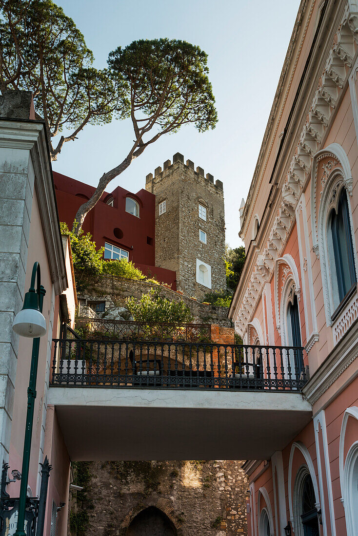 Low angle view of a walkway between buildings with unique facade, Capri, Campania, Italy