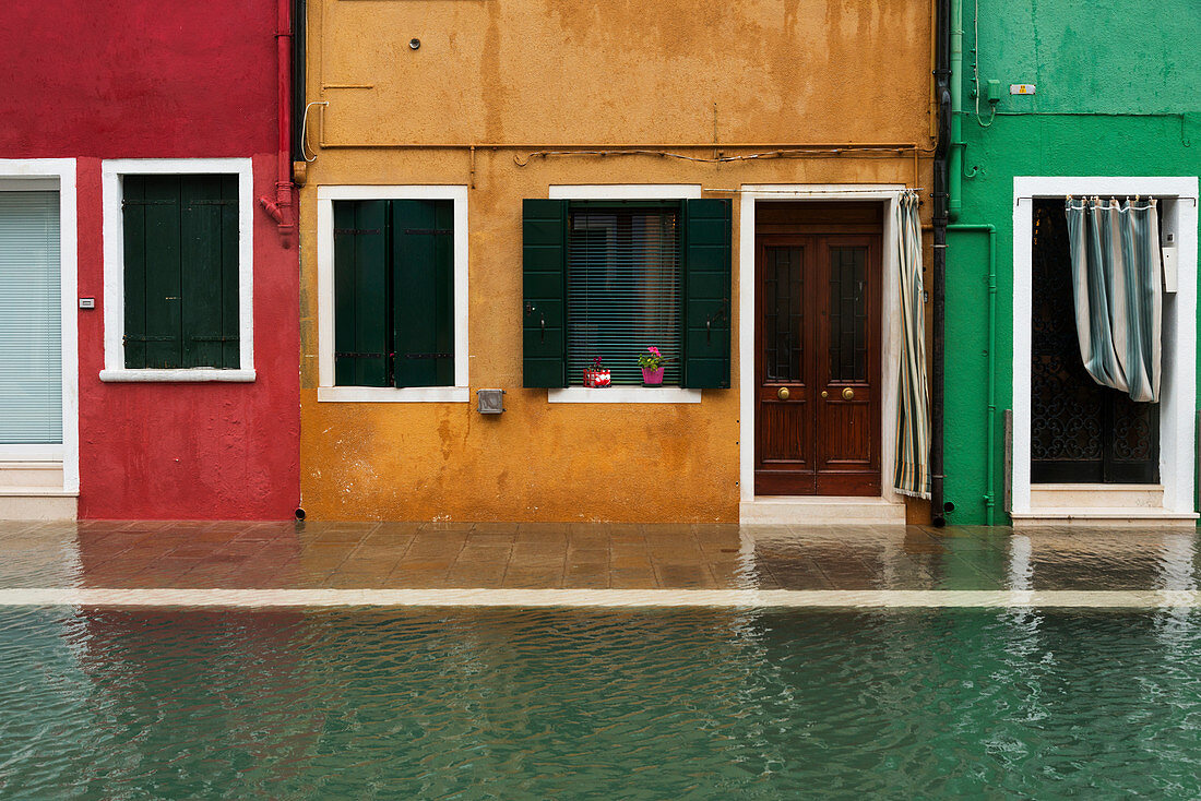 Colourful houses along a canal, Venice, Italy