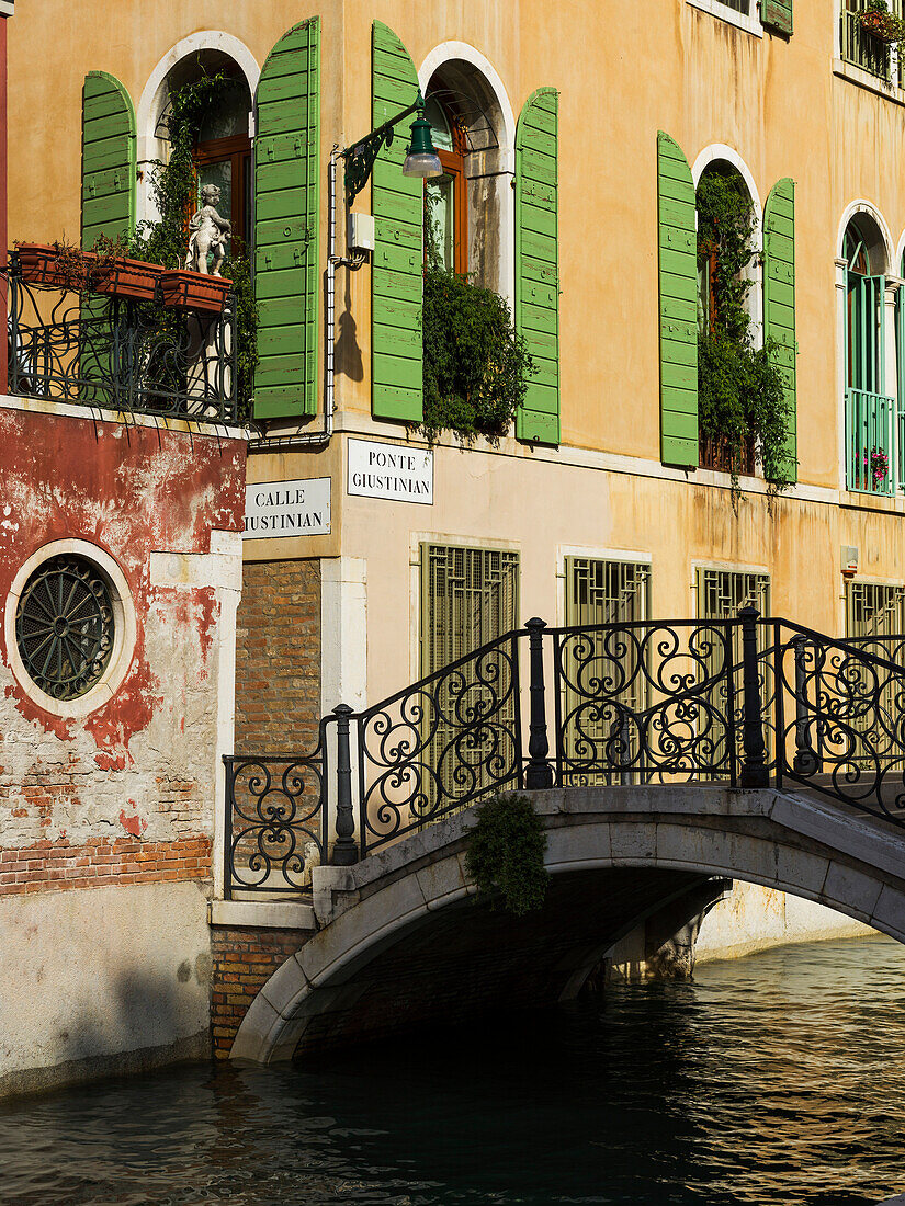 Footbridge across a canal, Venice, Italy